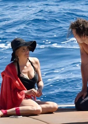 Mira Sorvino in Swimsuit on vacation in Capri